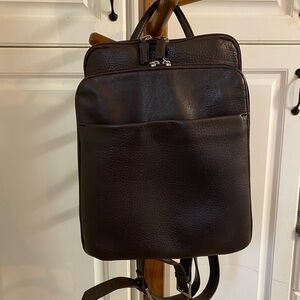 Ellington heavy leather backpack with lots of pockets, slightly used.